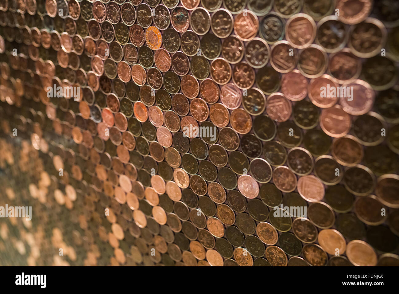 A surface made of 2p pieces in a pattern. Stock Photo