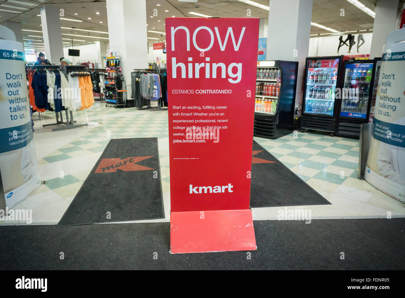A sign prominently placed at the entrance of a KMart store in New York