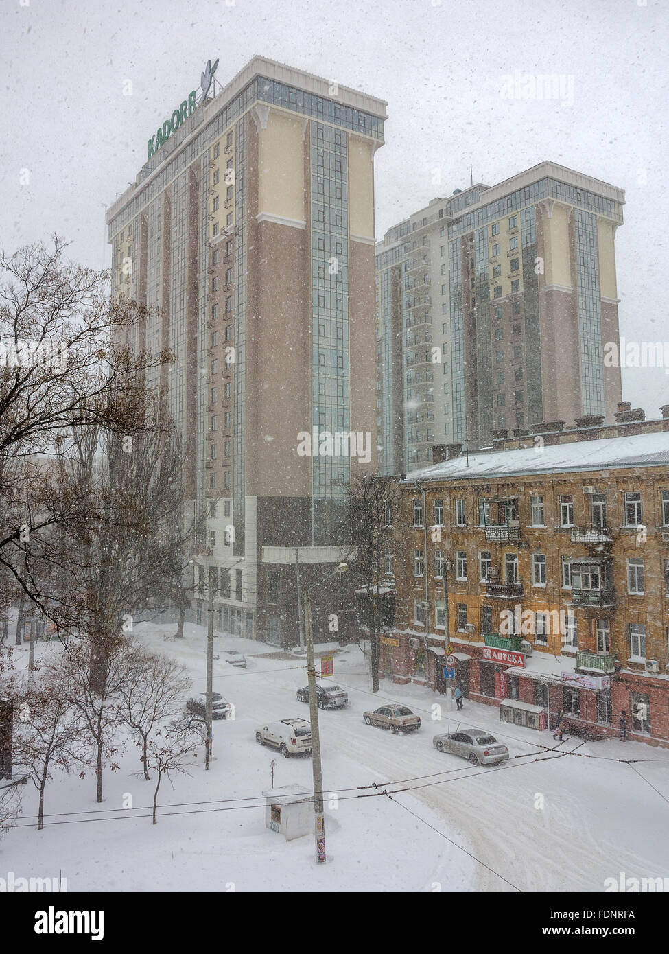 Odessa, Ukraine - January 18, 2016: A powerful cyclone, storm, heavy snow paralyzed the city. People walking on the street durin Stock Photo