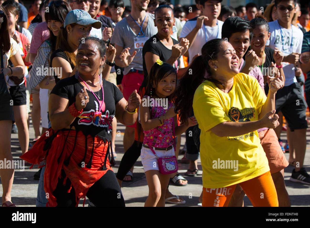 Relatives & visitors join in with Dancing Inmates at the Cebu Maximum Security Prison,Cebu City,Philippines Stock Photo