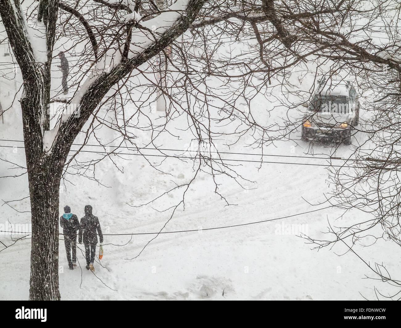 Odessa, Ukraine - January 18, 2016: A powerful cyclone, storm, heavy snow paralyzed the city. People walking on the street during a snowfall. Stopped Stock Photo
