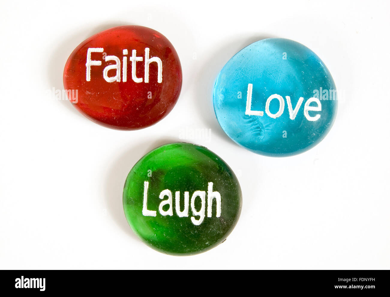 Faith Love Laugh Stones Stock Photo