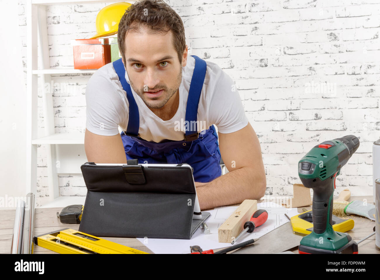 Smilling young man using hi-res stock photography and images - Alamy