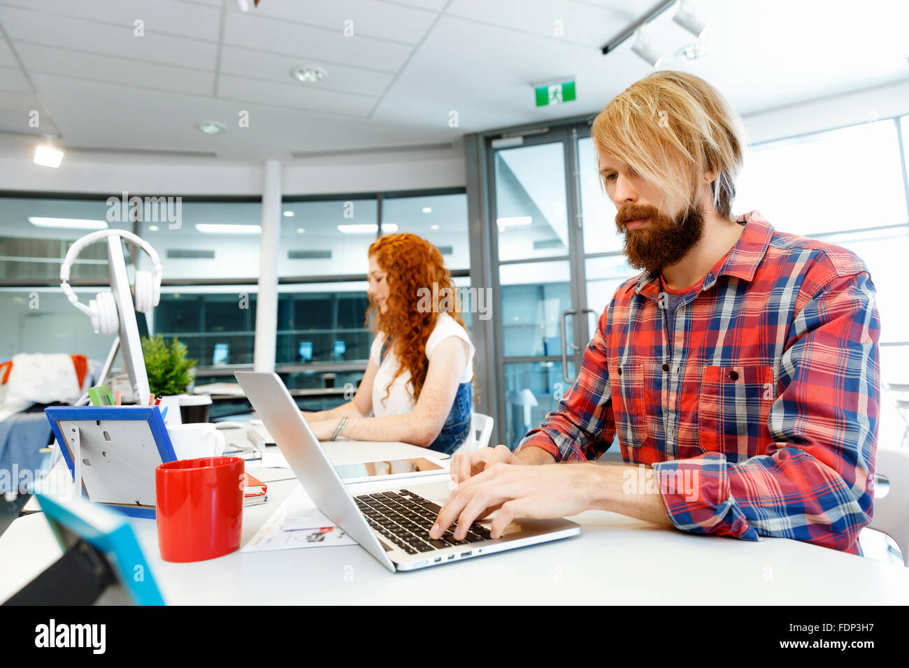 Business team working together in office Stock Photo - Alamy