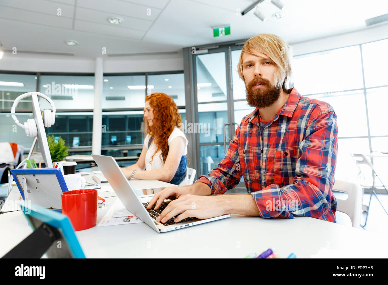 Business team working together in office Stock Photo - Alamy