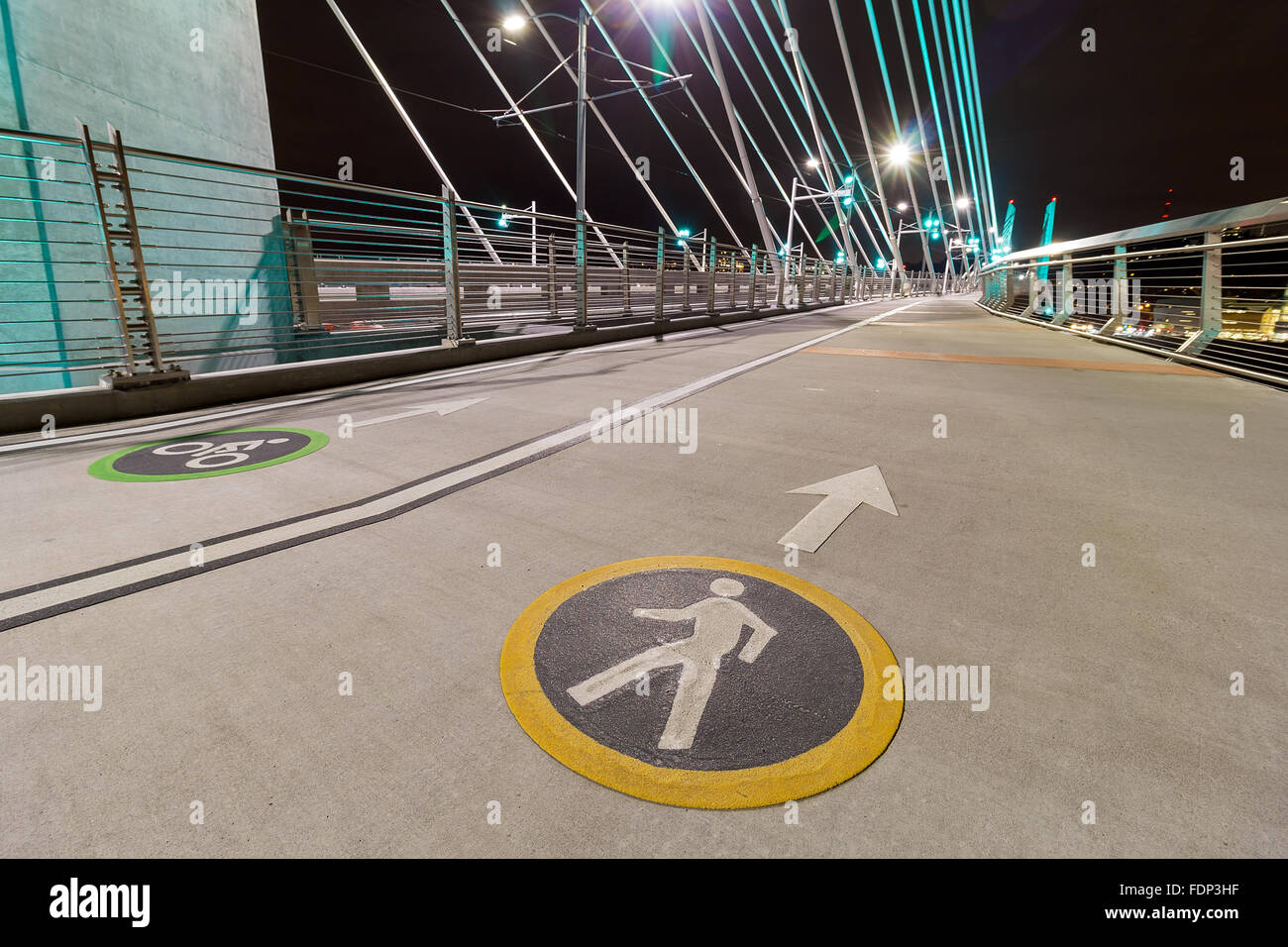 Bicycle Cyclist and Pedestrian Lane Signs on Tilikum Crossing Bridge in Portland Oregon Stock Photo