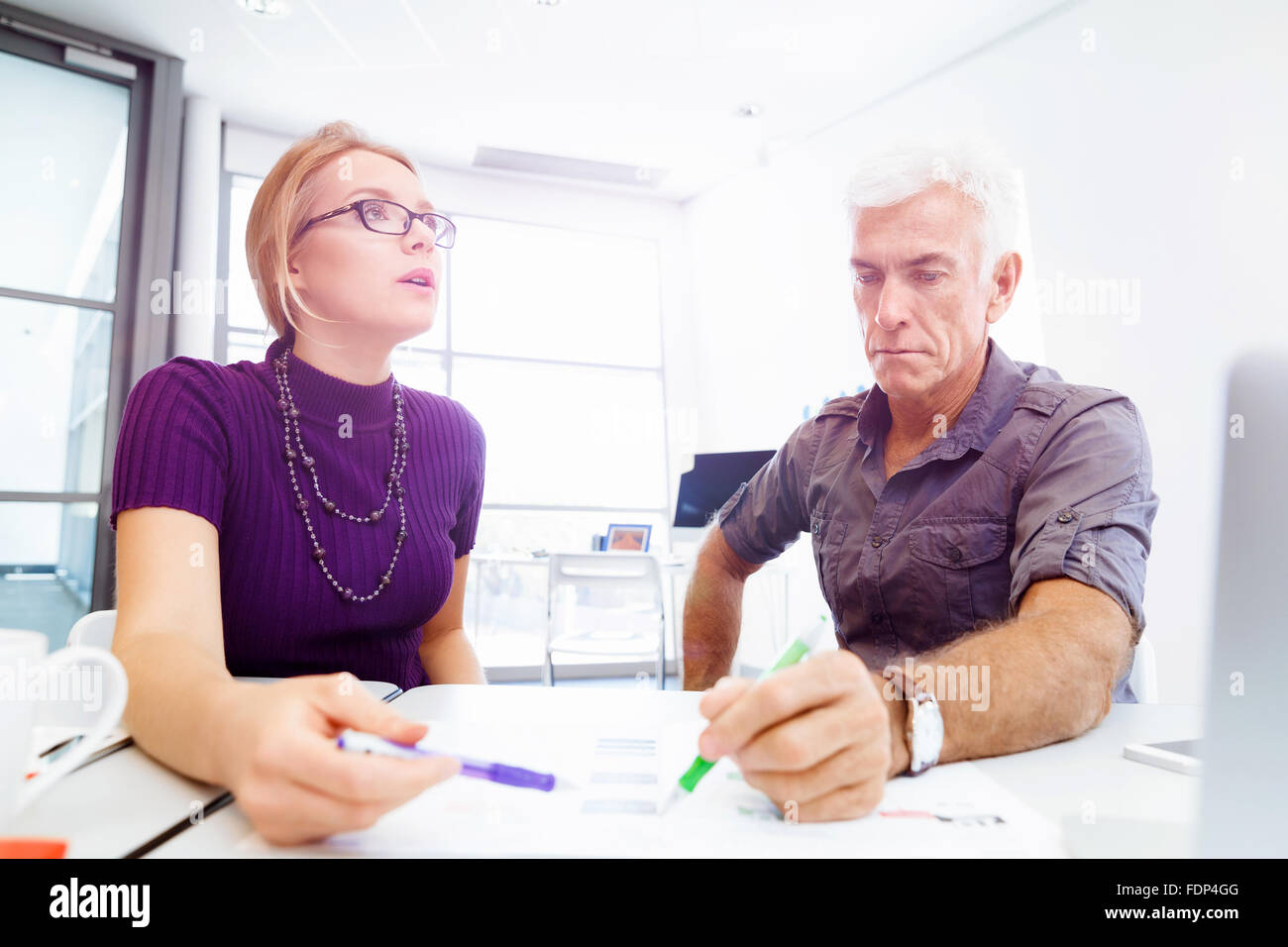Business team working together in office Stock Photo - Alamy