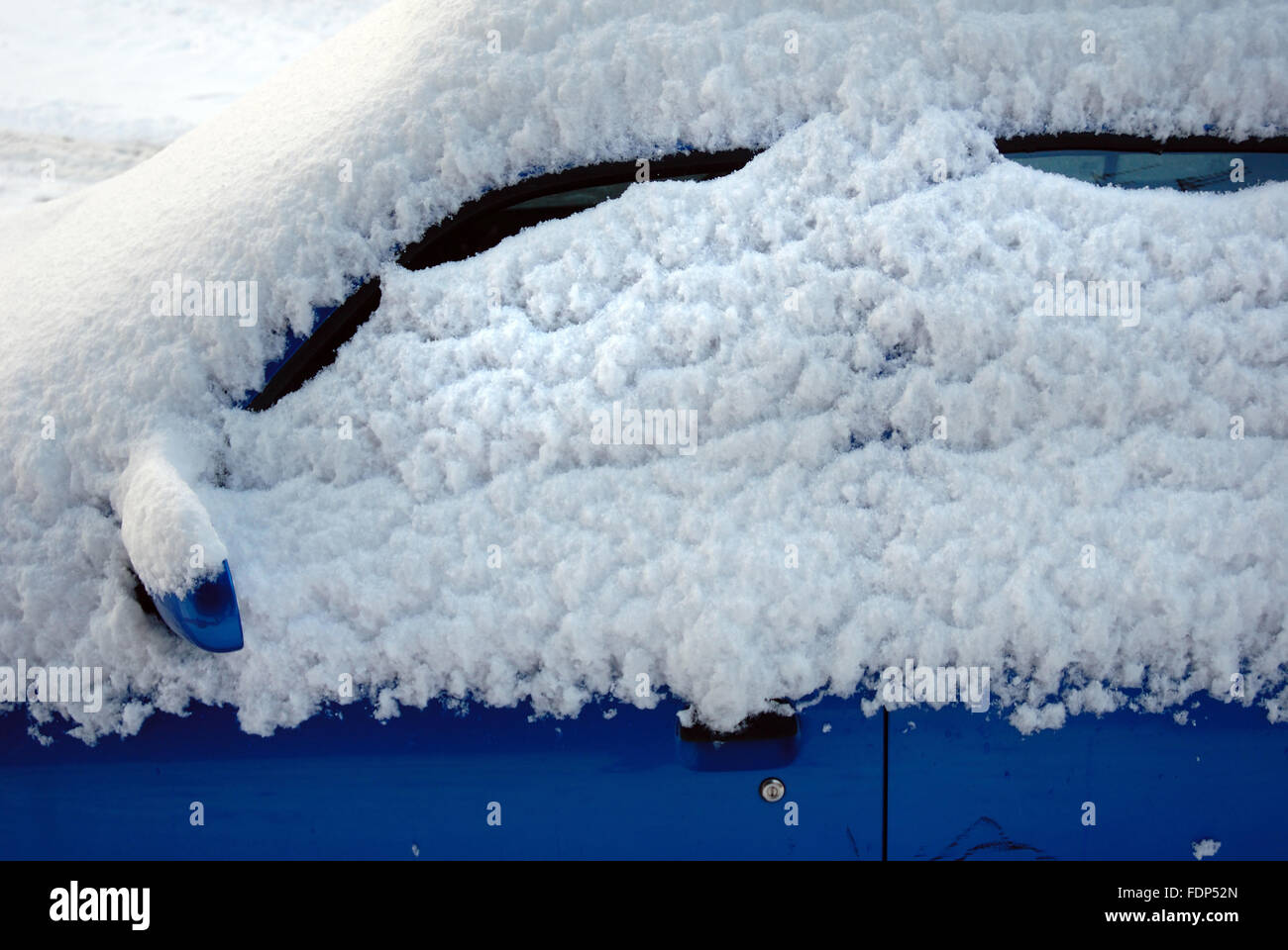 Car covered in snow Stock Photo Alamy