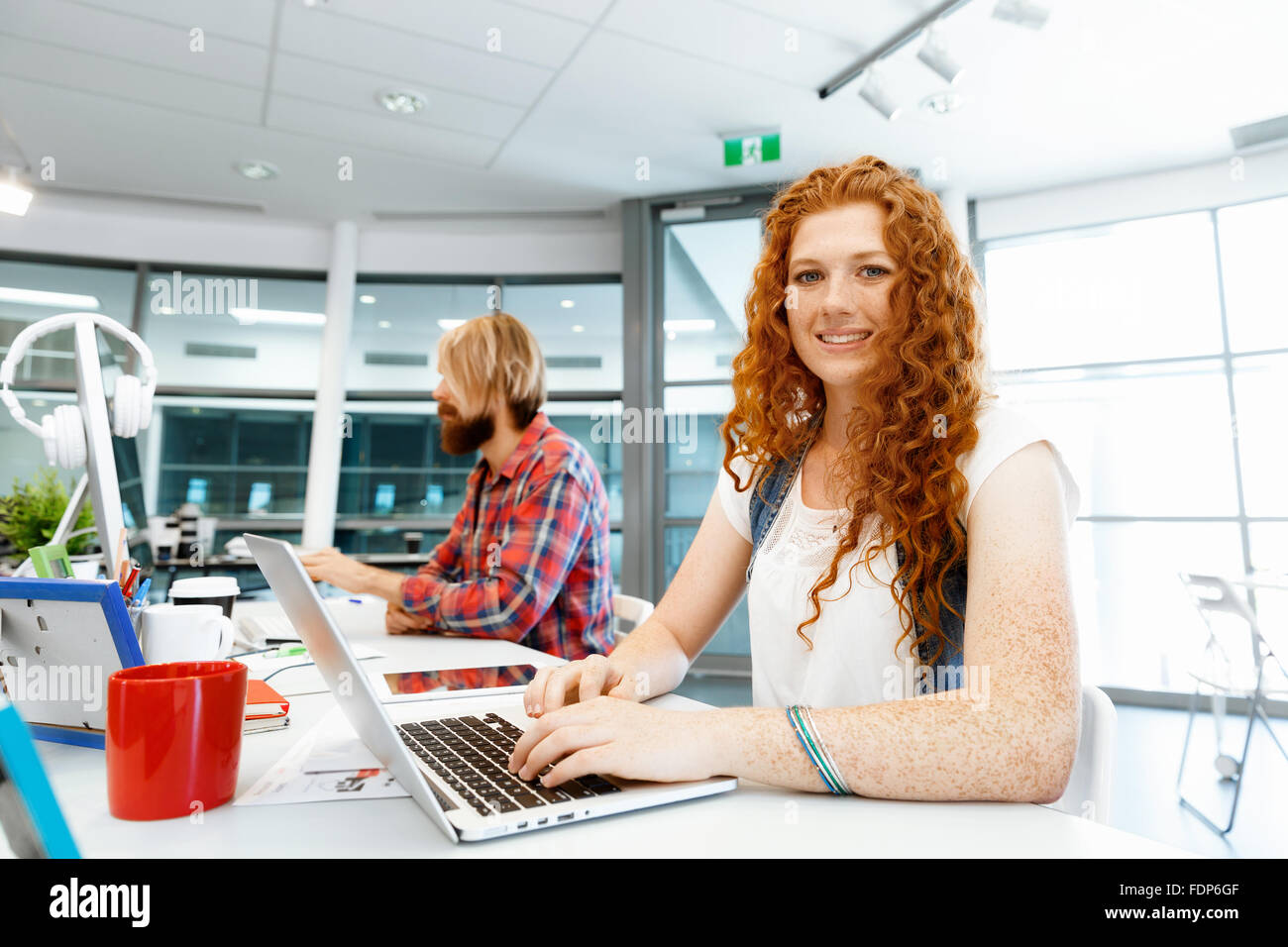 Business team working together in office Stock Photo - Alamy