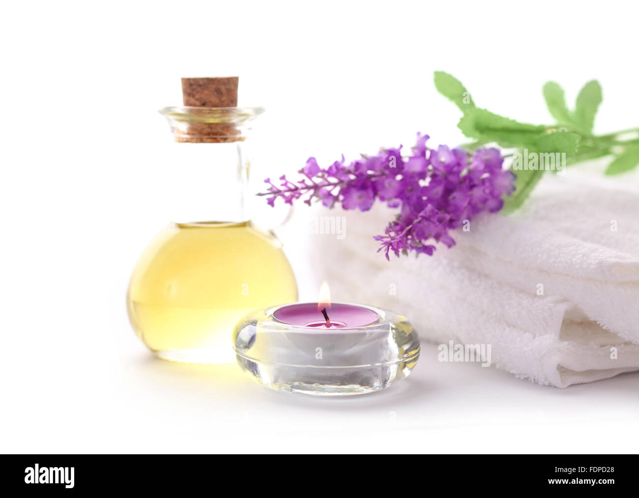 candle,lavender blossom,massage oil,lavender scent Stock Photo