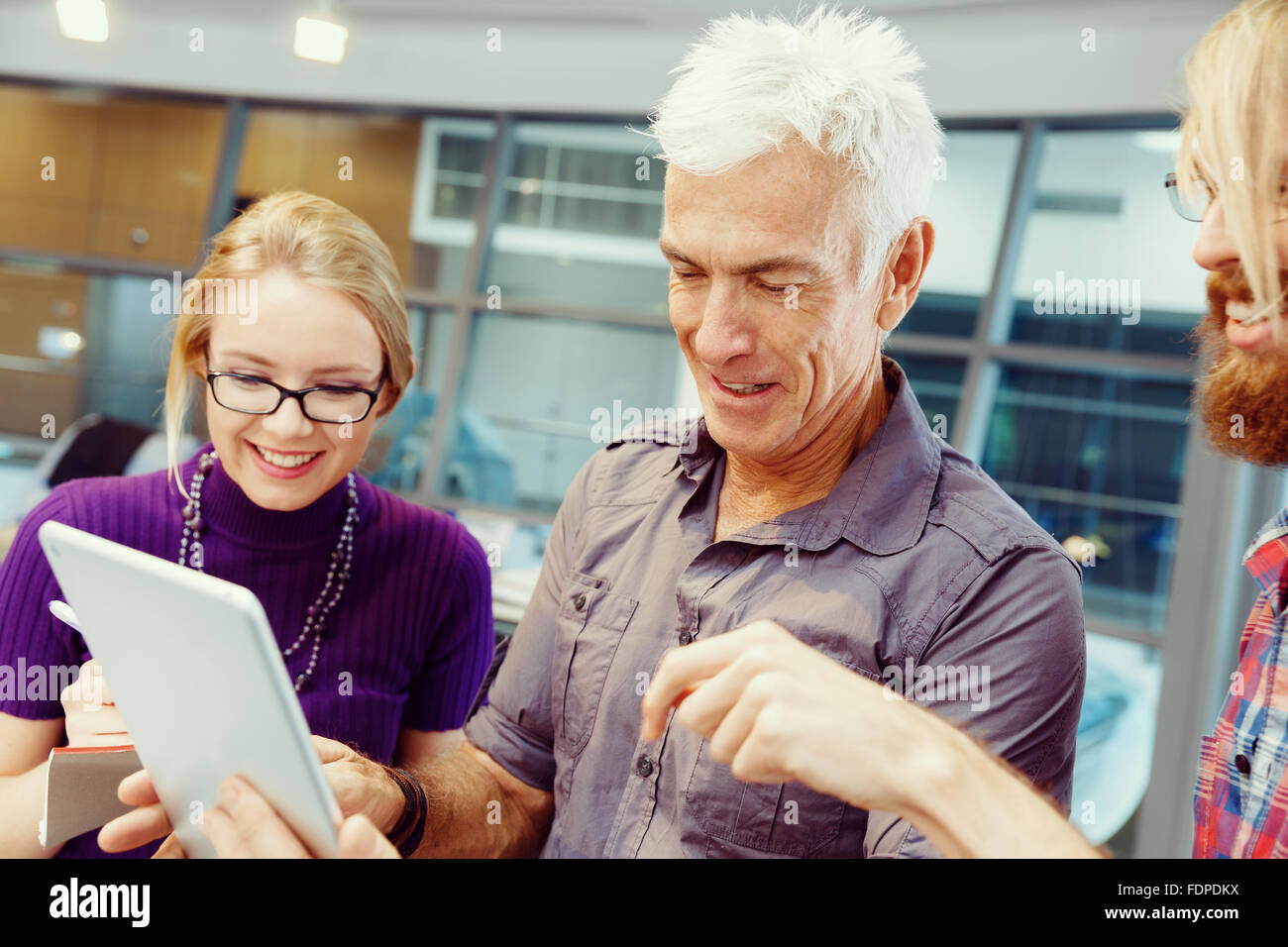 Business team working together in office Stock Photo - Alamy