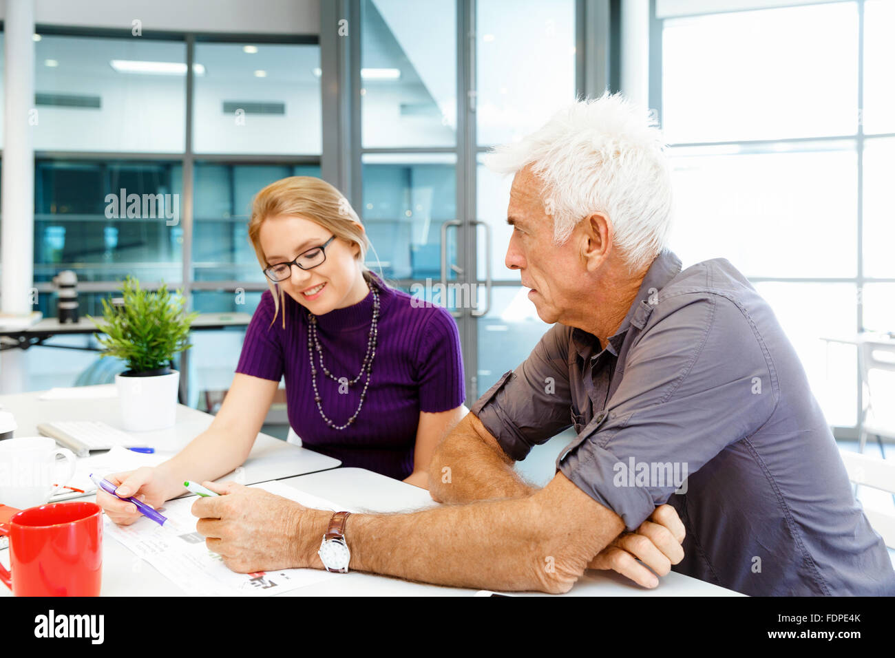 Business team working together in office Stock Photo - Alamy