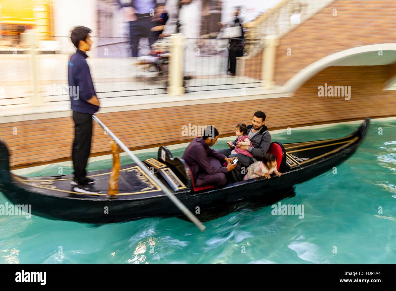 People Taking A Gondola Ride, Villaggio Shopping Mall, Doha, Qatar Stock Photo
