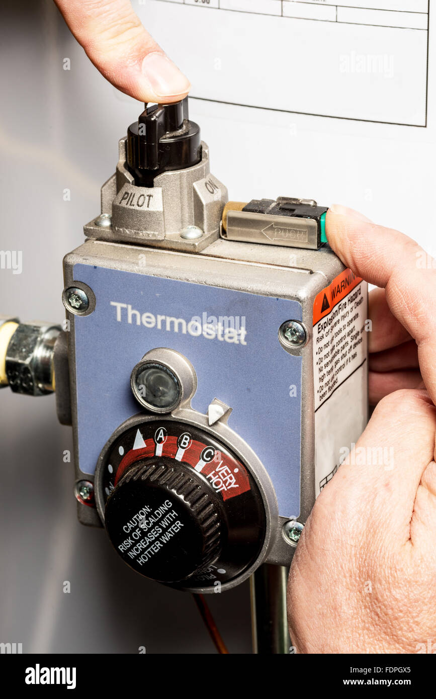 Demonstrating the lighting of a pilot light Stock Photo Alamy