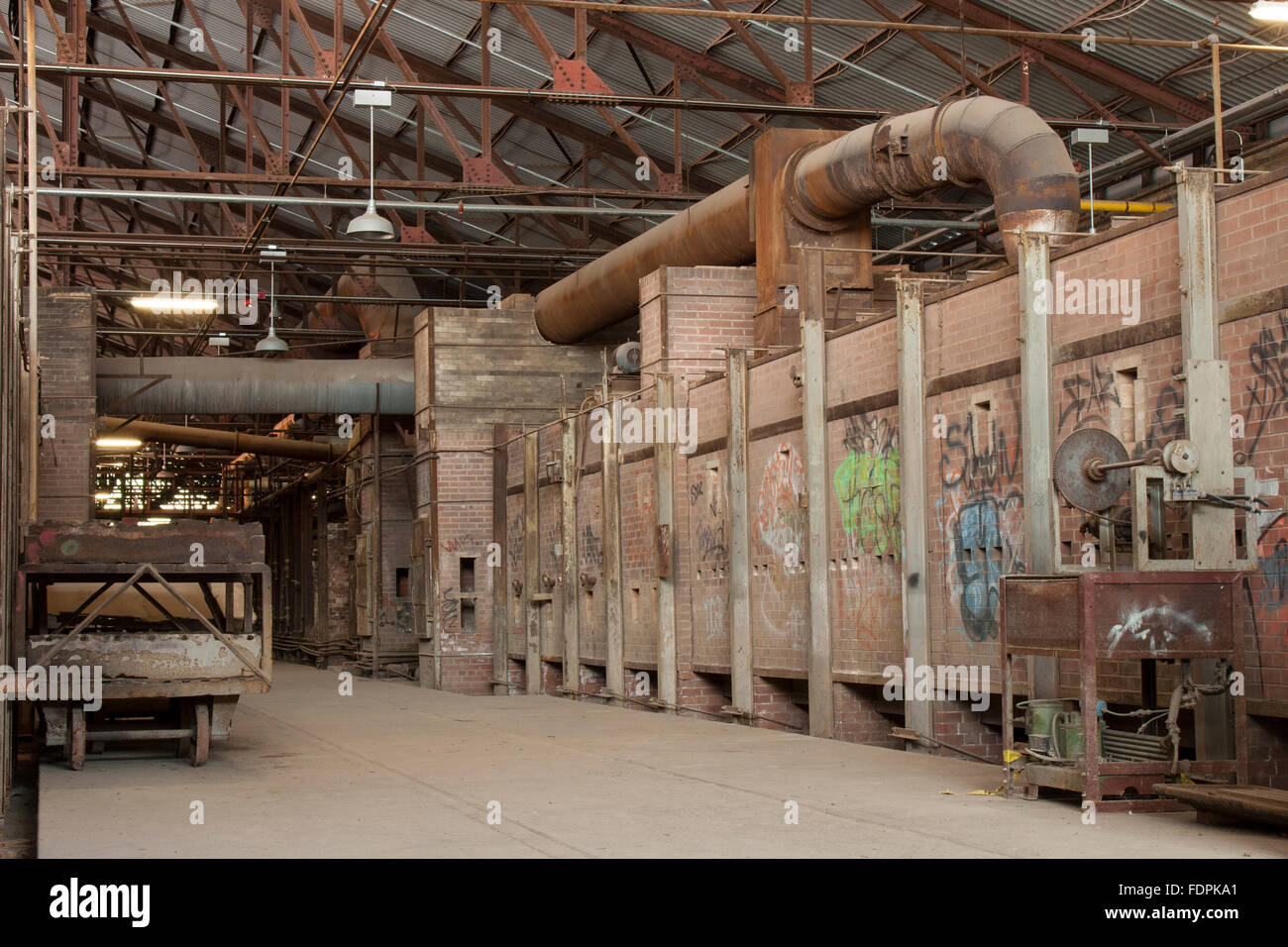 old abandoned brick factory with ovens and with graffitti Stock Photo ...