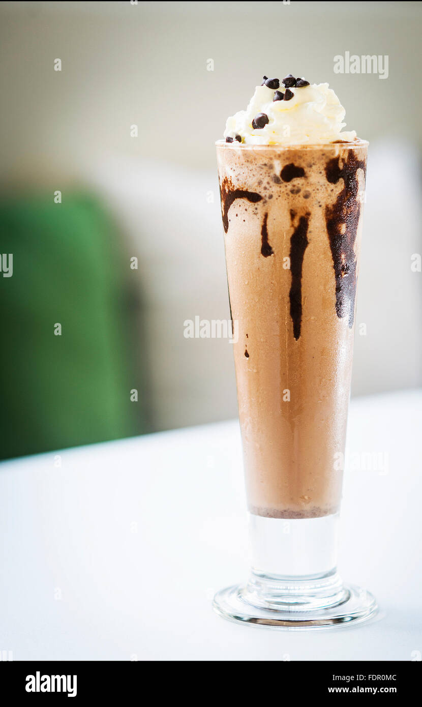 chocolate ice cream milk shake glass with whipped cream Stock Photo