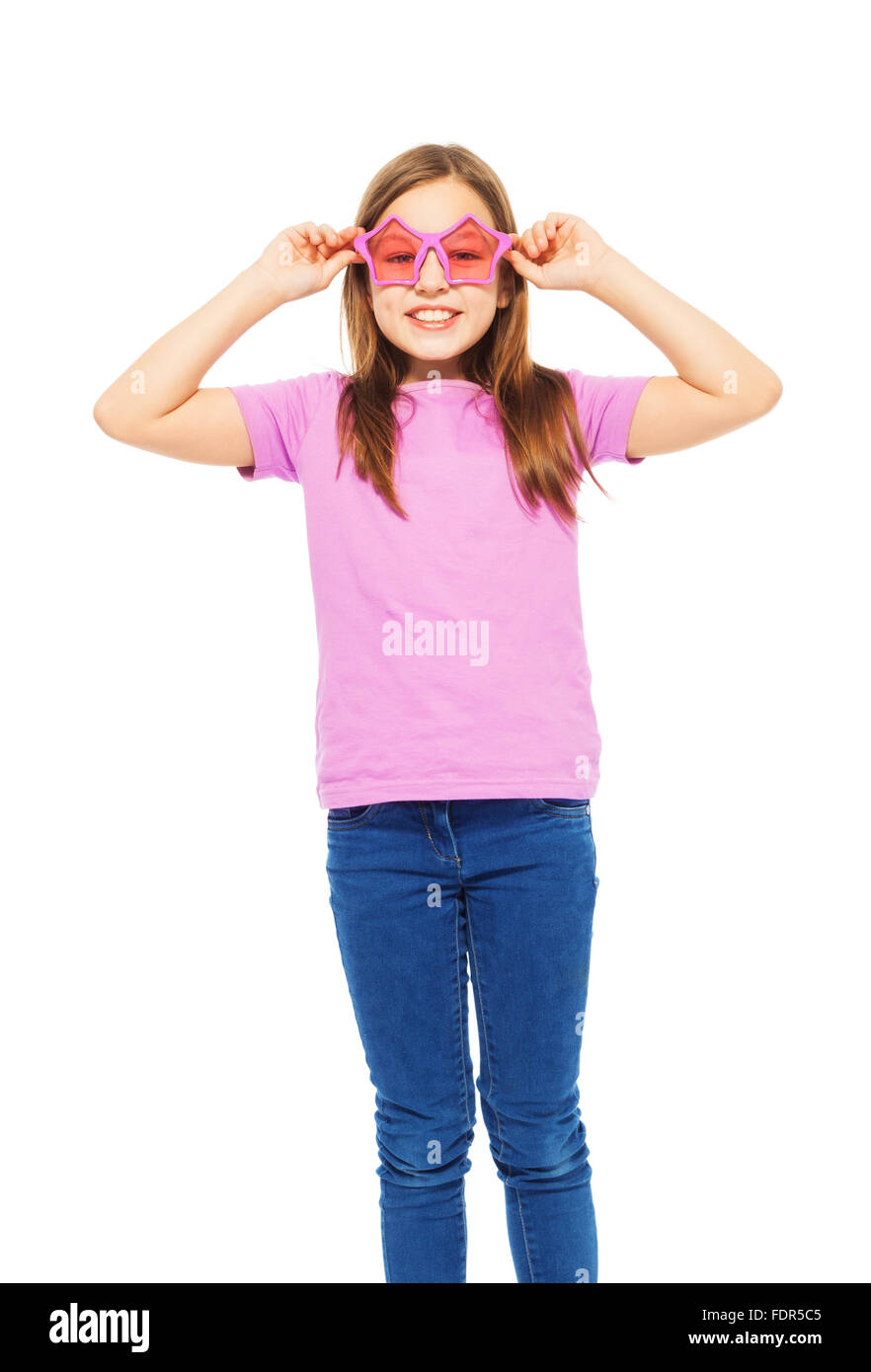Pretty girl wearing funny pink glasses and t-shirt Stock Photo
