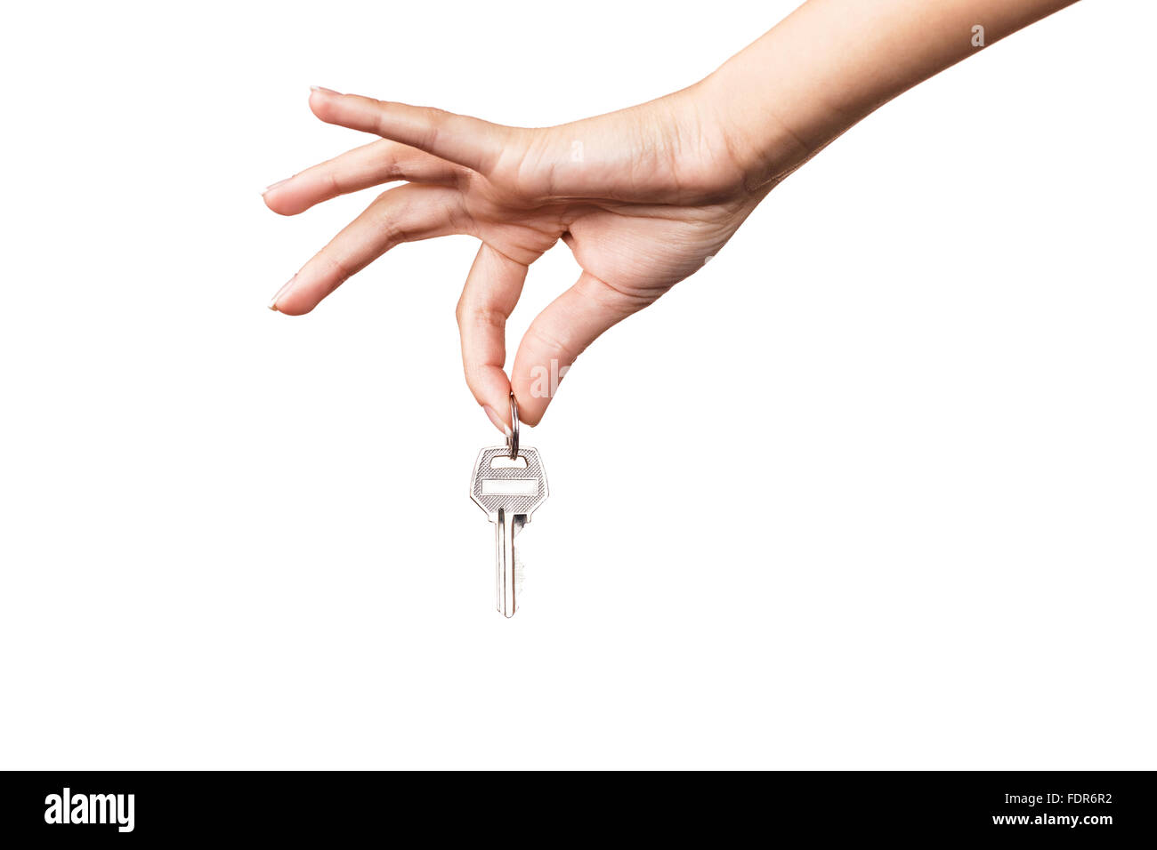 Woman's hand giving keys Stock Photo