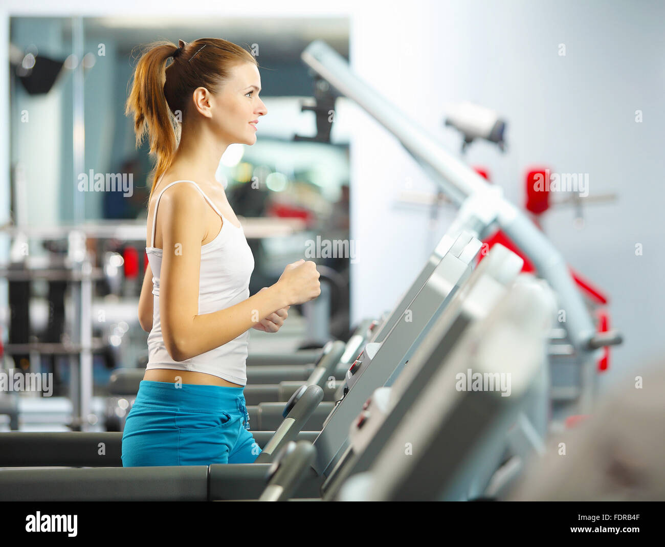 Image of fitness girl running on treadmill Stock Photo Alamy