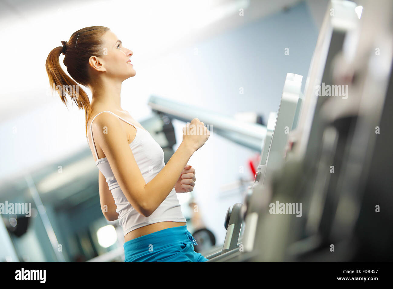 Image of fitness girl running on treadmill Stock Photo Alamy