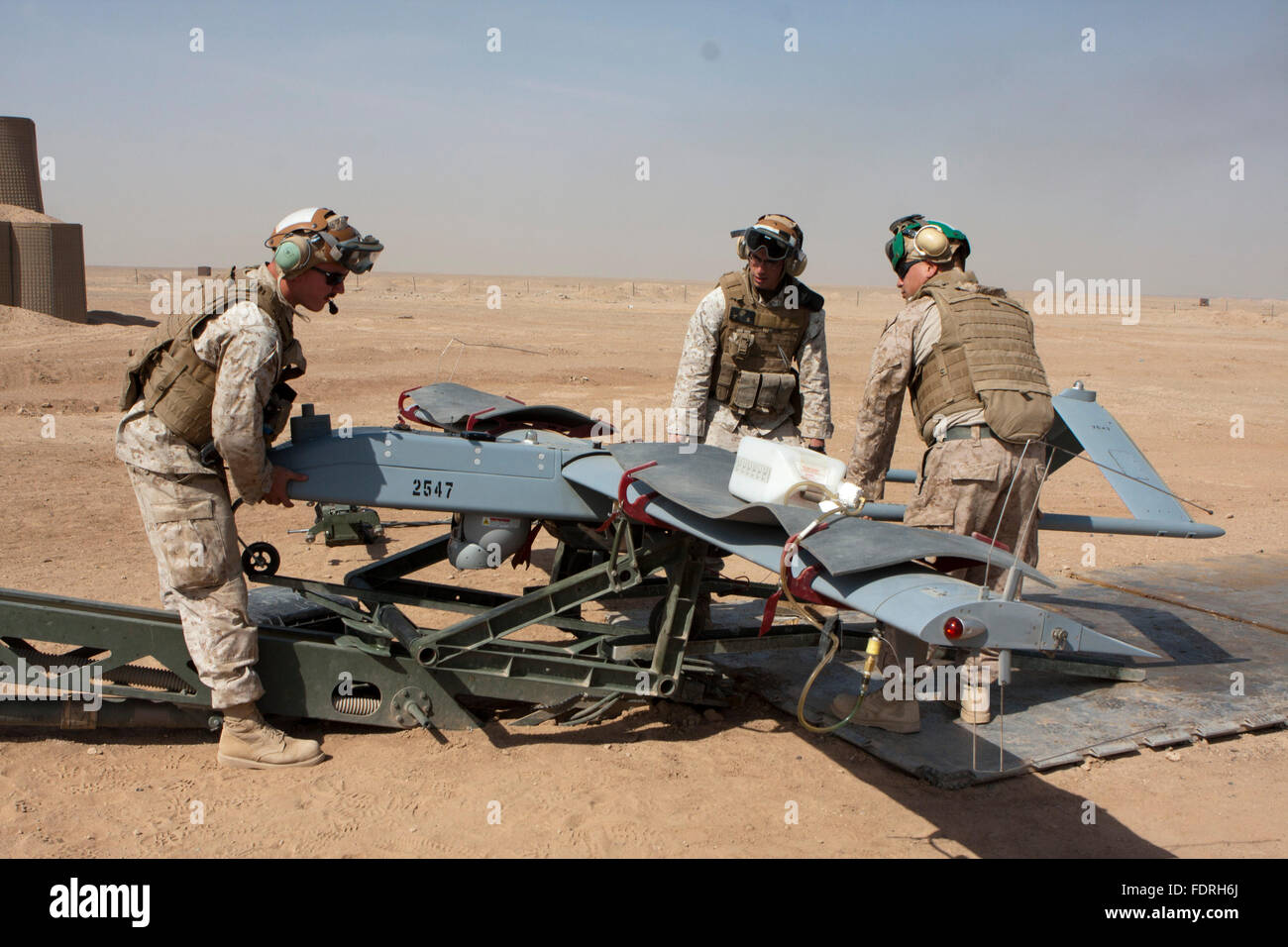 U.S. soldiers prepare to launch unmanned aerial vehicles - UAVs - or as most commonly known - drones. Stock Photo