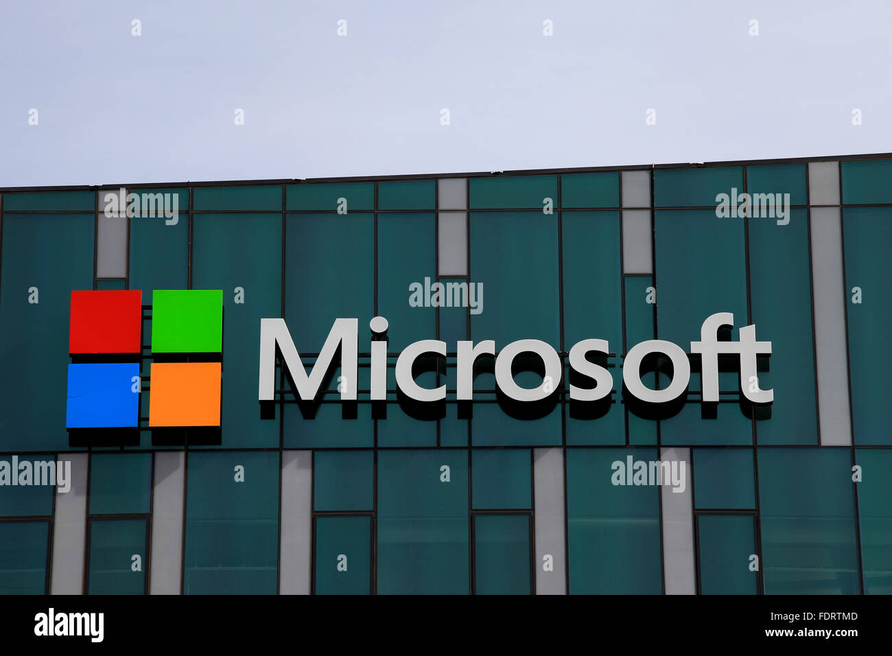 Microsoft logo and emblem. Microsoft is an international corporation that develops, supports and sells computer software and ser Stock Photo