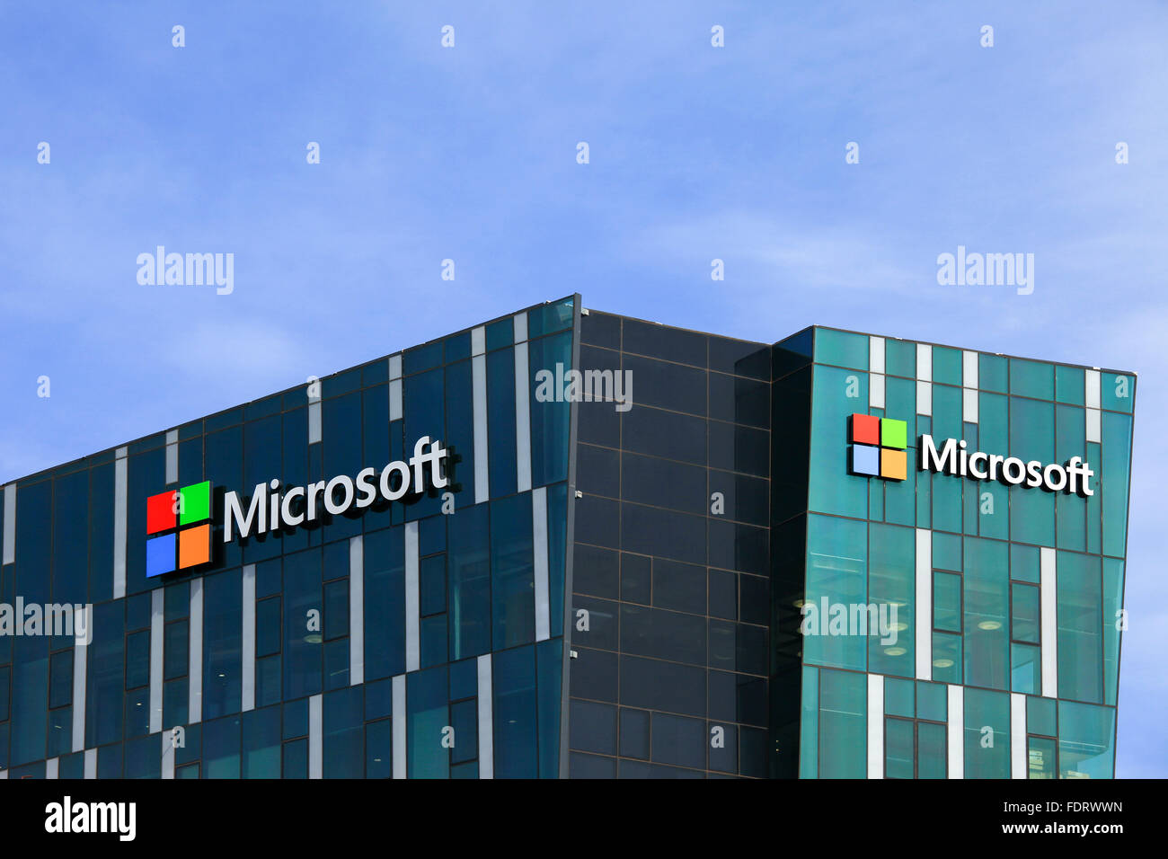 Microsoft logo and emblem. Microsoft is an international corporation that develops, supports and sells computer software and ser Stock Photo
