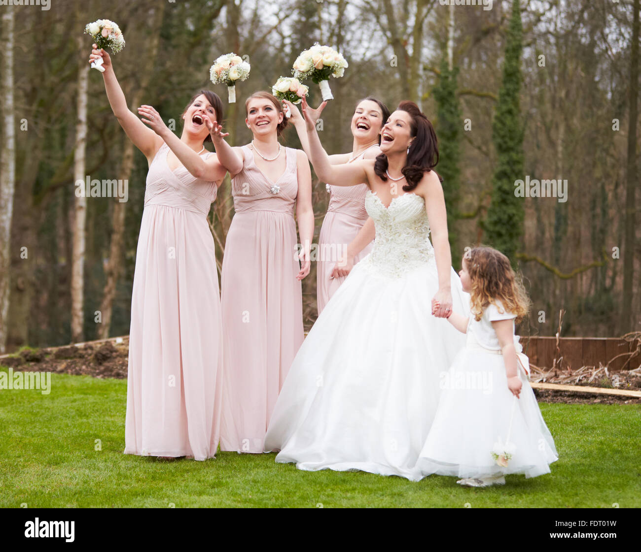 Woman catching wedding bouquet hires stock photography and images Alamy
