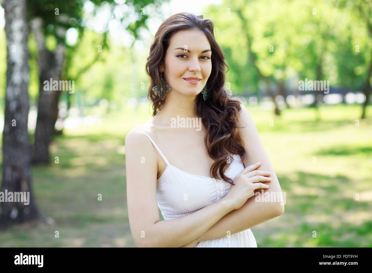 Beautiful young woman in the park. Outdoor portrait Stock Photo - Alamy
