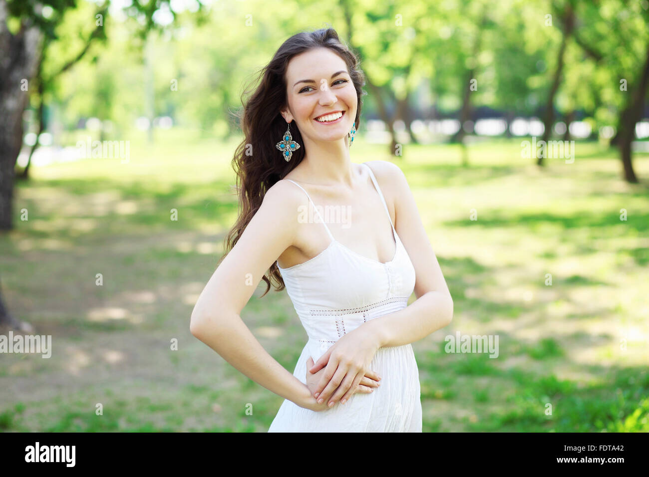 Beautiful young woman in the park. Outdoor portrait Stock Photo - Alamy