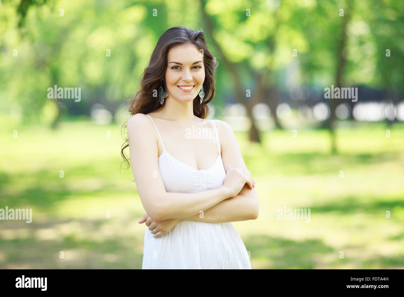 Beautiful young woman in the park. Outdoor portrait Stock Photo - Alamy