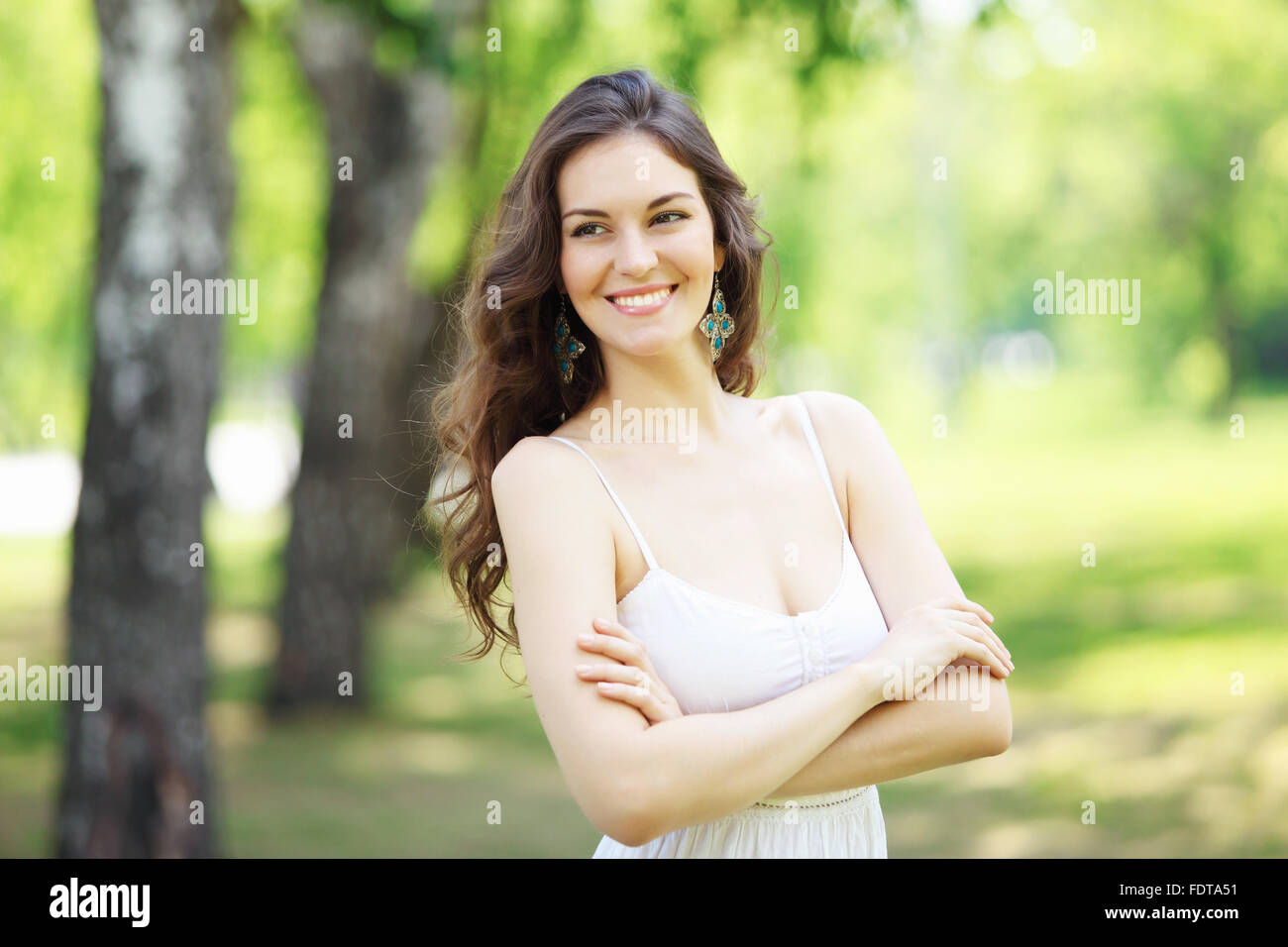 Beautiful young woman in the park. Outdoor portrait Stock Photo - Alamy
