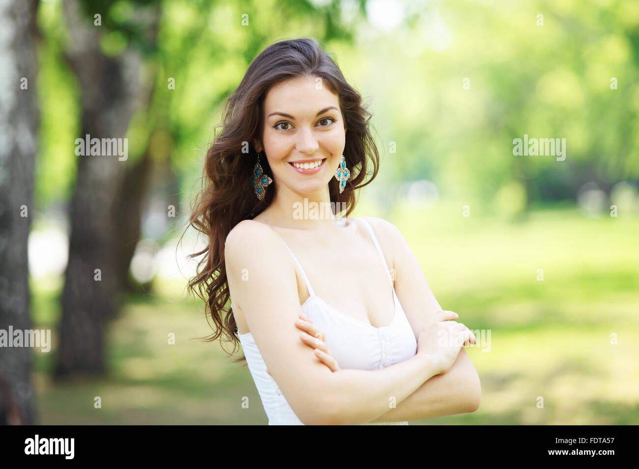 Beautiful young woman in the park. Outdoor portrait Stock Photo - Alamy