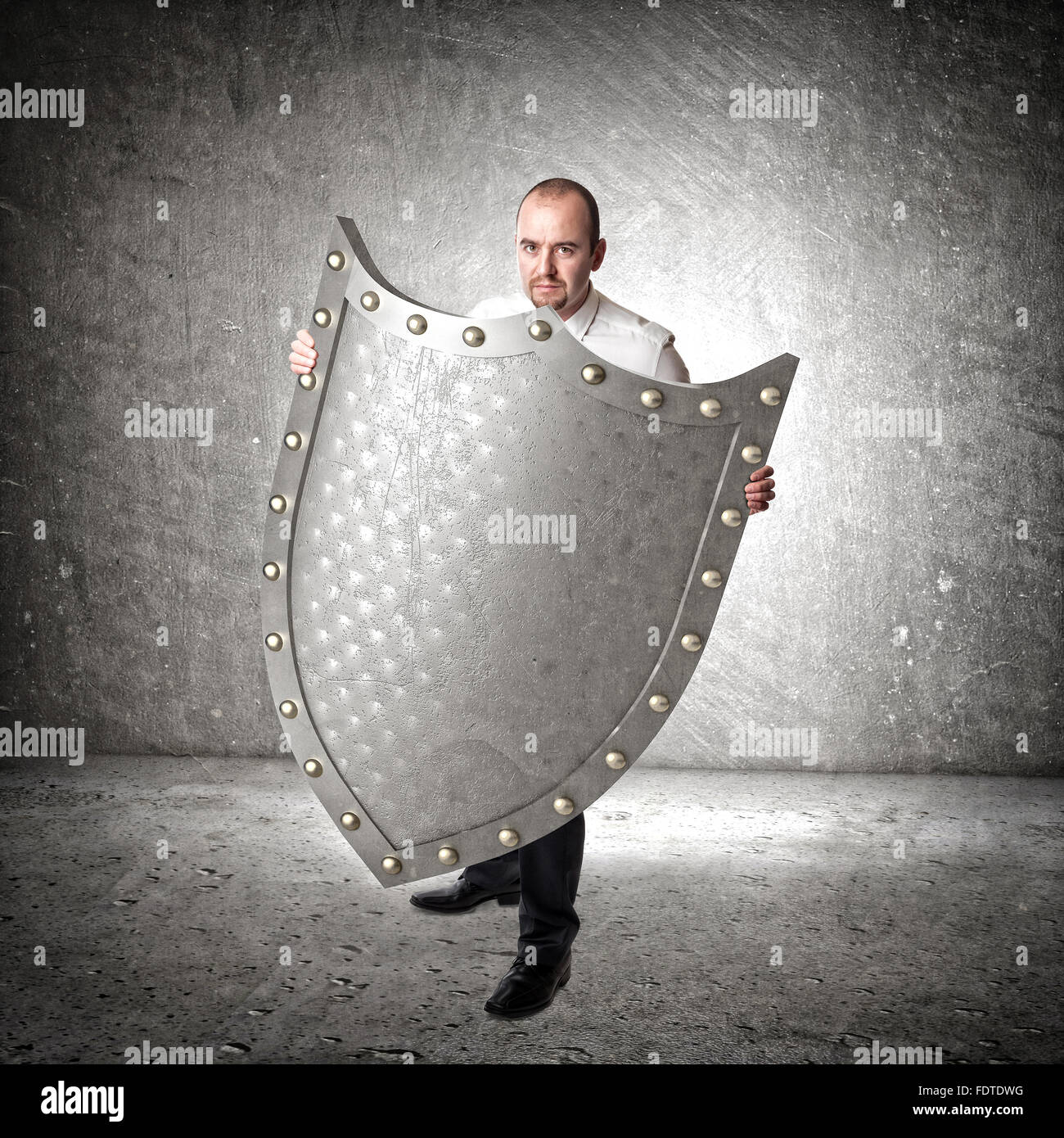 3d metal shield abstract background and businessman Stock Photo
