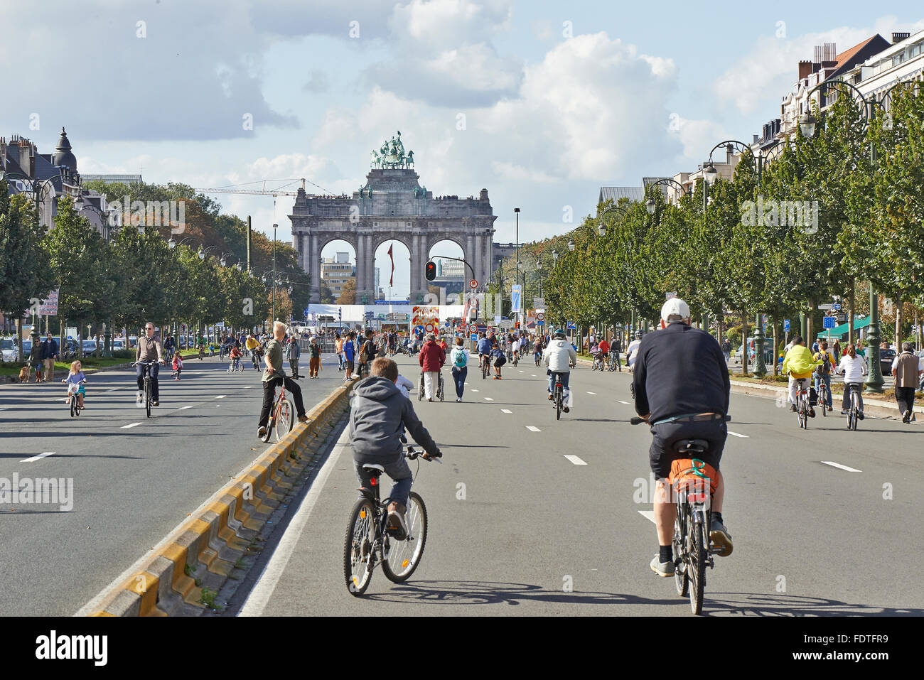 Bicyclist and walkers enjoy Car Free Streets on Tervueren Ave as part of Brussels City's Stock Photo