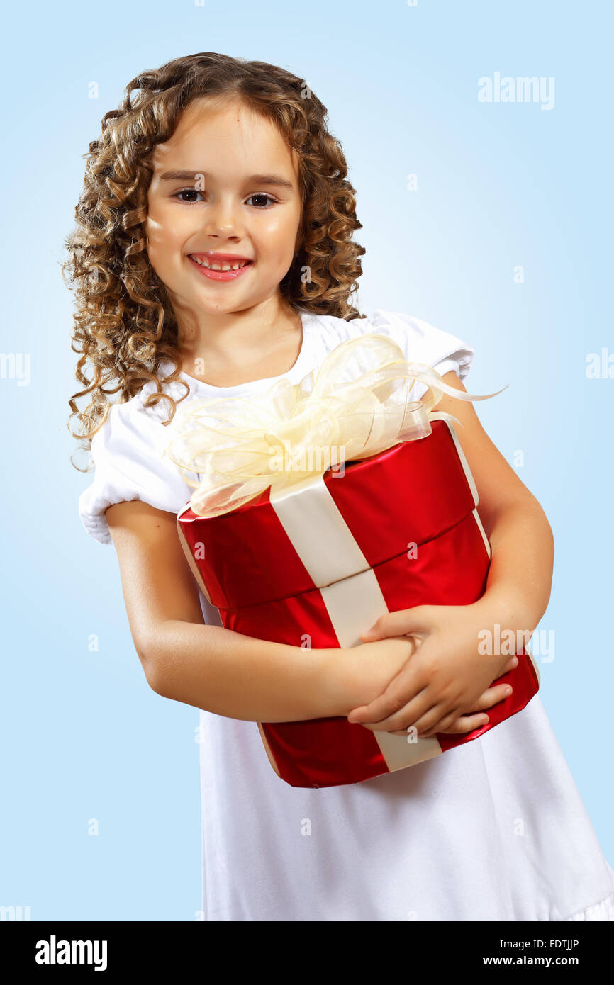 Portrait of an adorable preschool age girl wearing a Christmas holiday outfit Stock Photo