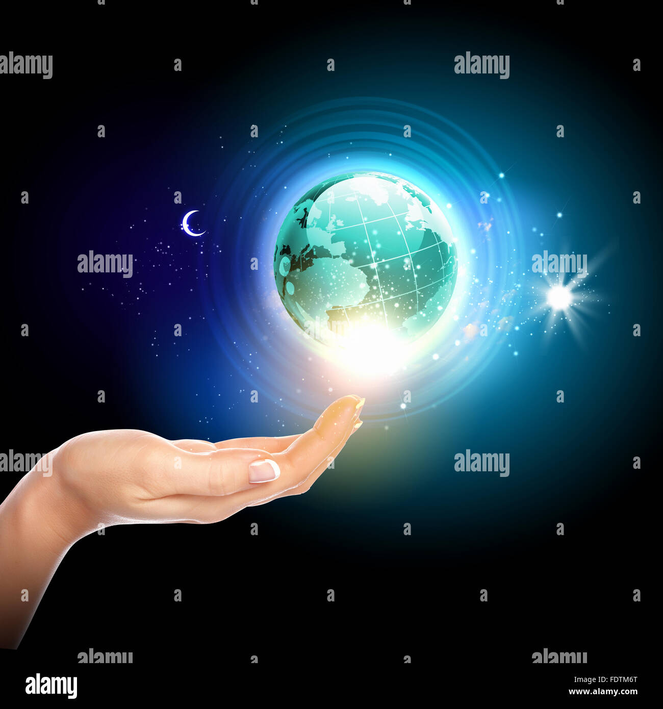 Human hand holding our planet earth glowing Stock Photo - Alamy