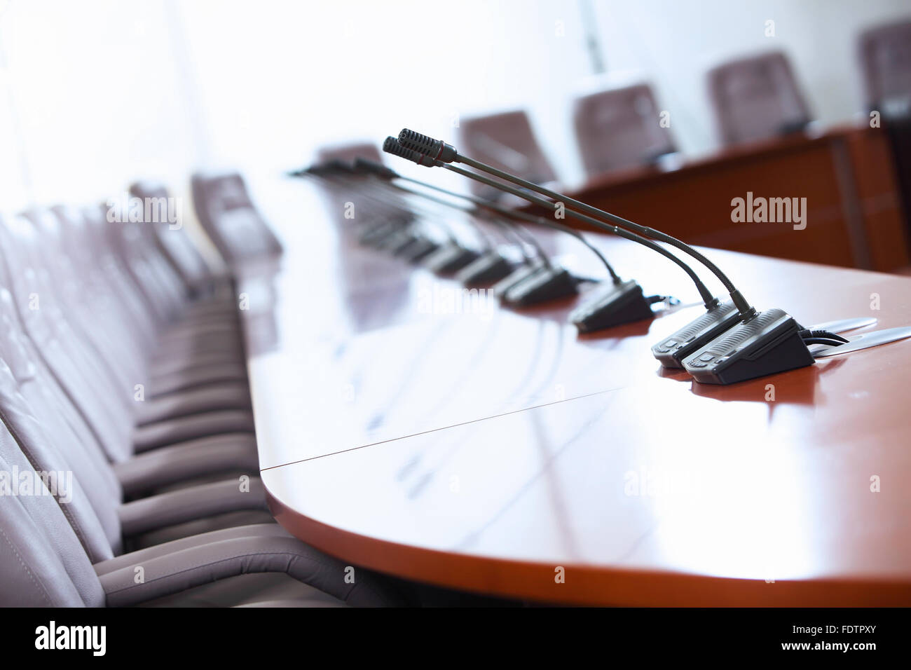 before a conference, the microphones in front of empty chairs Stock ...