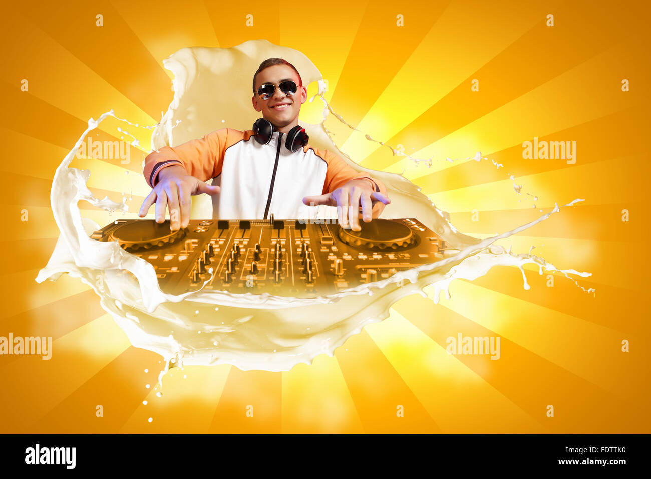 DJ with a mixer equipment to control sound and play music Stock Photo