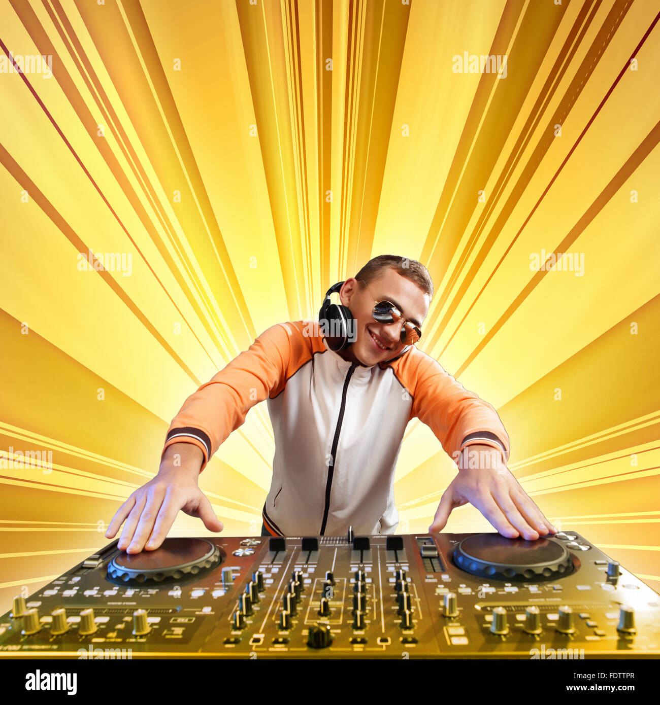 DJ with a mixer equipment to control sound and play music Stock Photo
