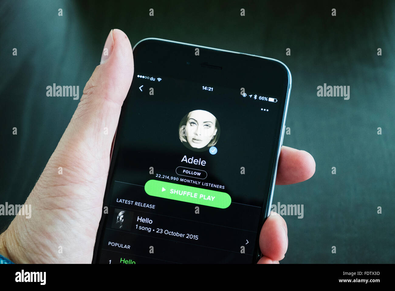 Spotify online music streaming app showing Adele on an iPhone 6 plus smart phone Stock Photo