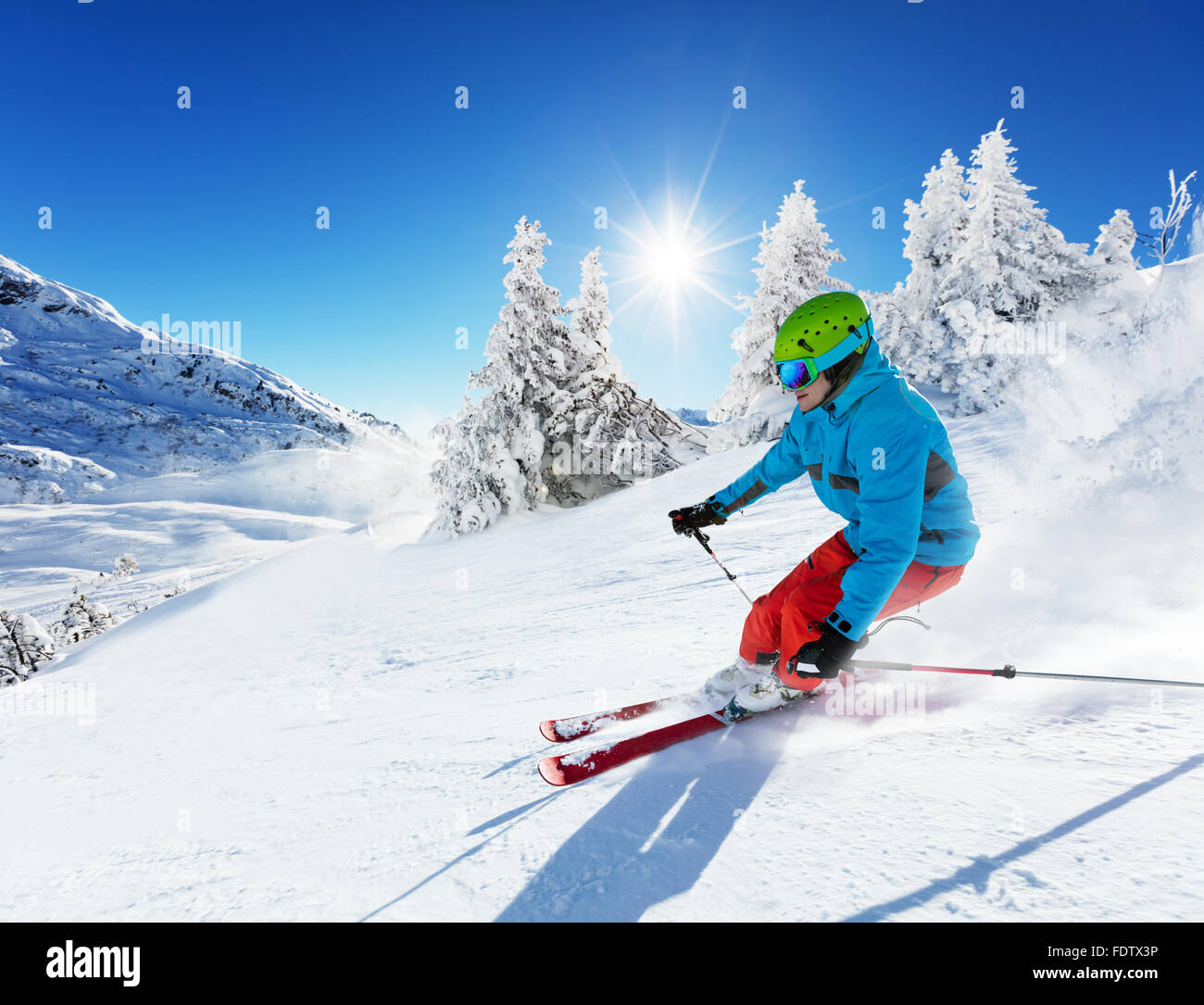 Man skier in Alps Stock Photo