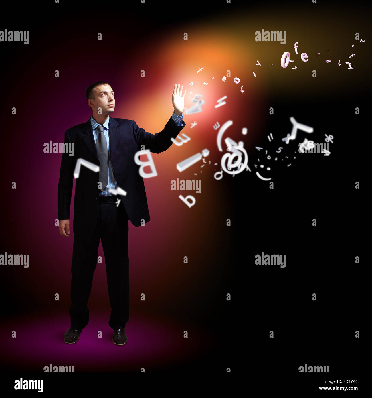 Businessman standing with modern technology symbols next to him Stock ...