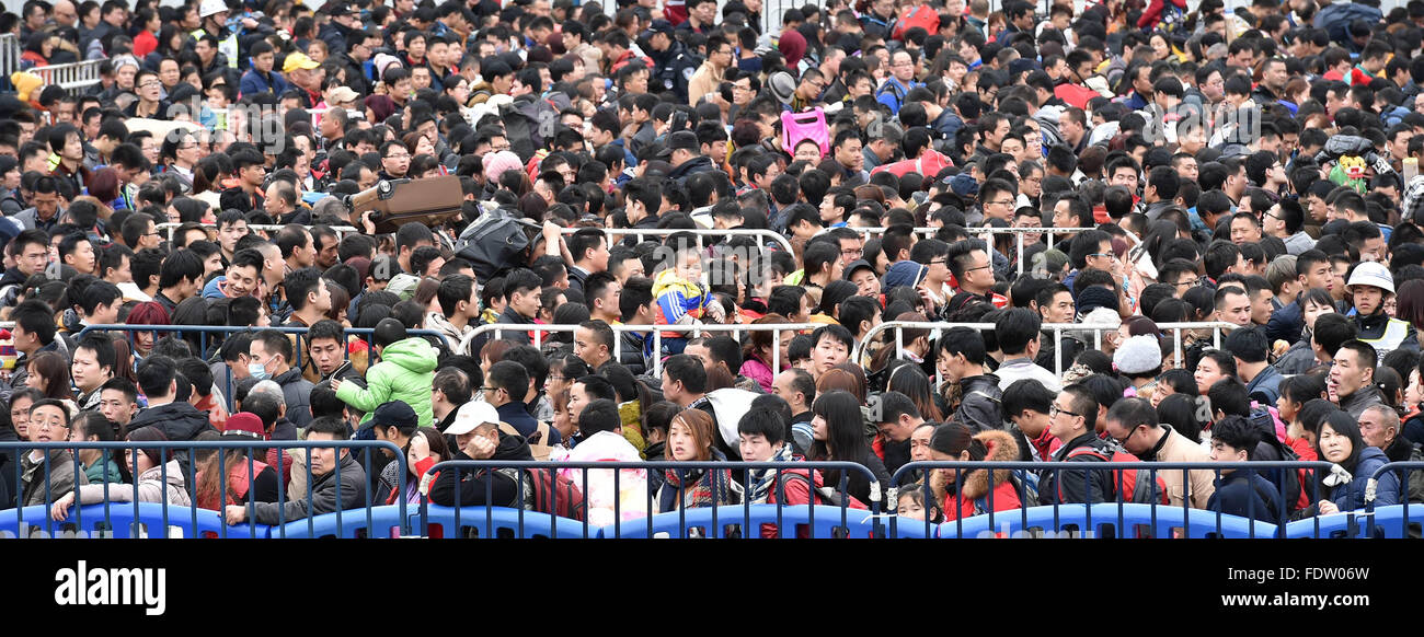 Guangzhou, China's Guangdong Province. 2nd Feb, 2016. Passengers rushing home for the coming Spring Festival, or the Chinese Lunar New Year, are seen stranded out of Guangzhou railway station in Guangzhou, south China's Guangdong Province, Feb. 2, 2016. Some 50,000 passengers were detained in the railway station due to delays of trains caused by continous bad weather. Credit:  Lu Hanxin/Xinhua/Alamy Live News Stock Photo