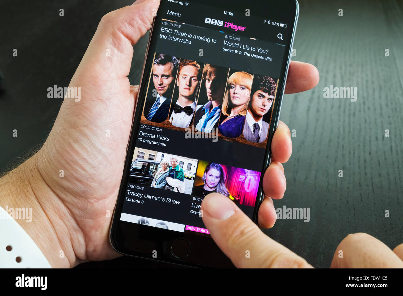 Home screen of BBC iPlayer catchup TV streaming service on iPhone 6 Plus smart phone Stock Photo