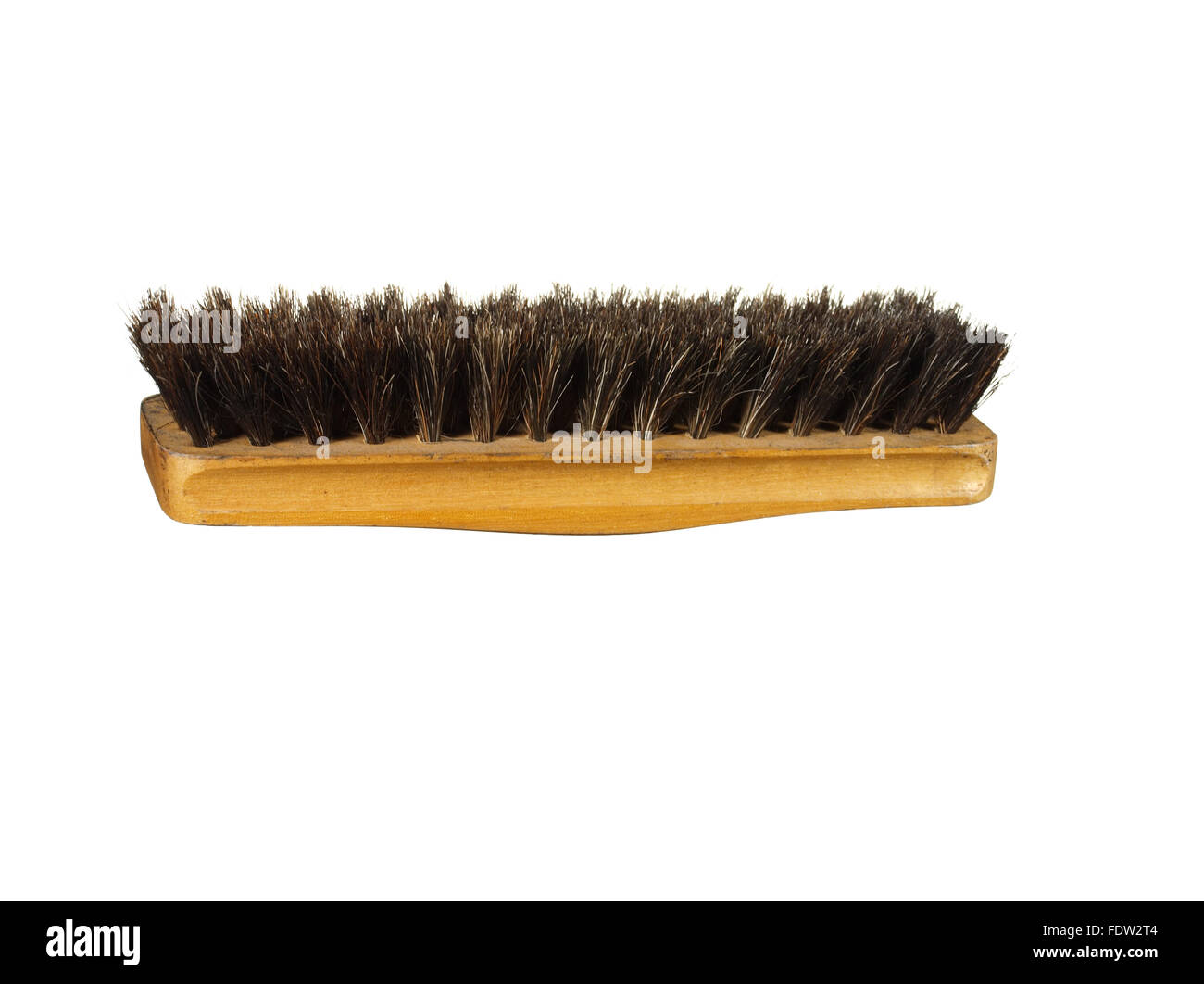 Old clothes (or shoe) brush with wooden handle isolated on the white background Stock Photo