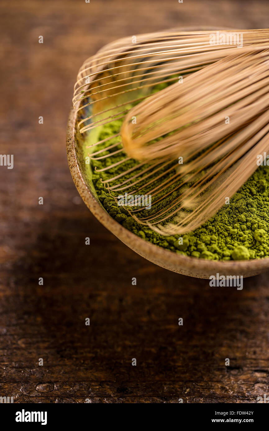 Powder green tea with whisk, matcha Stock Photo Alamy