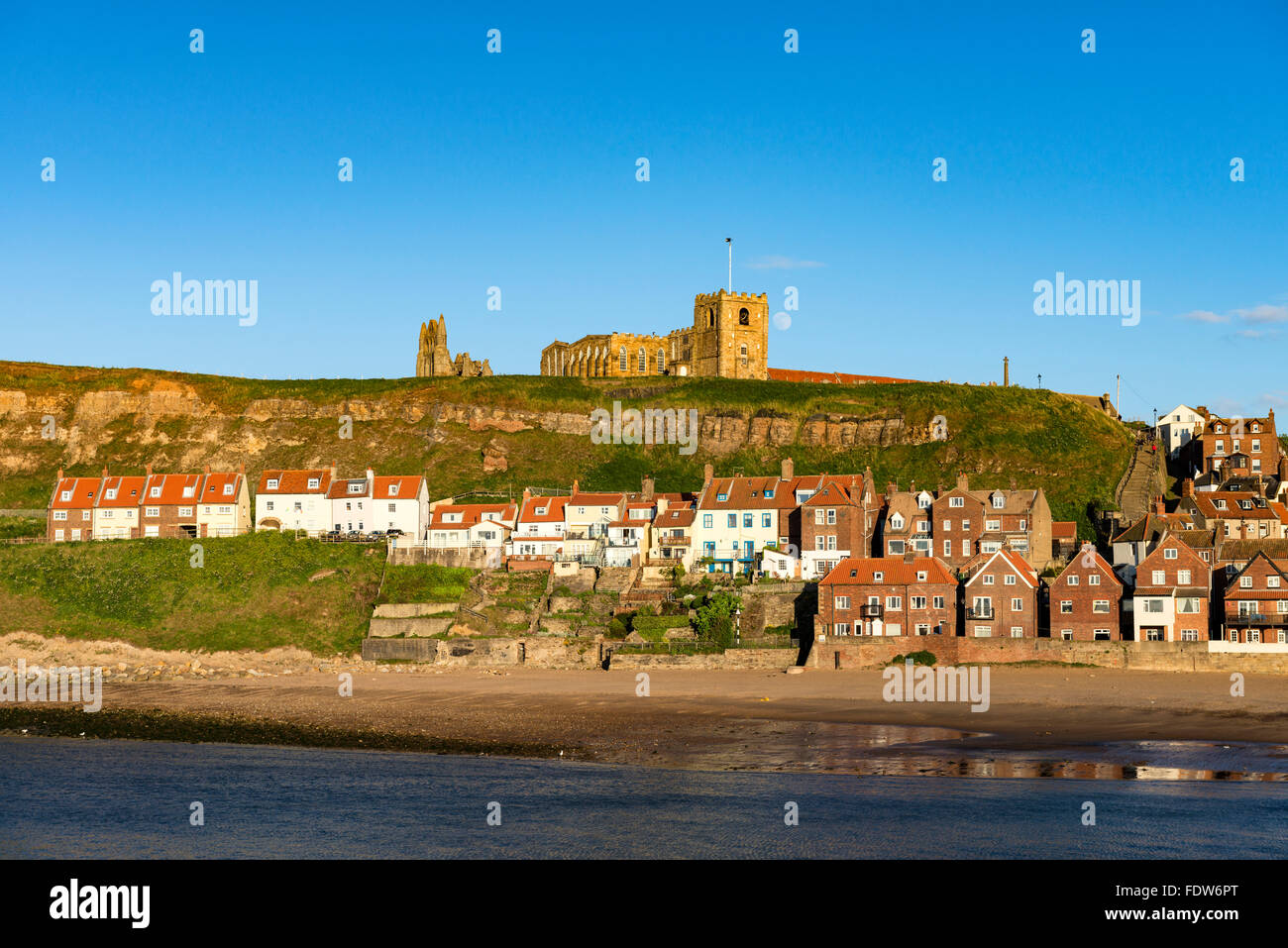 Whitby old town and St. Mary's church on a bright, sunny, summer's evening Stock Photo