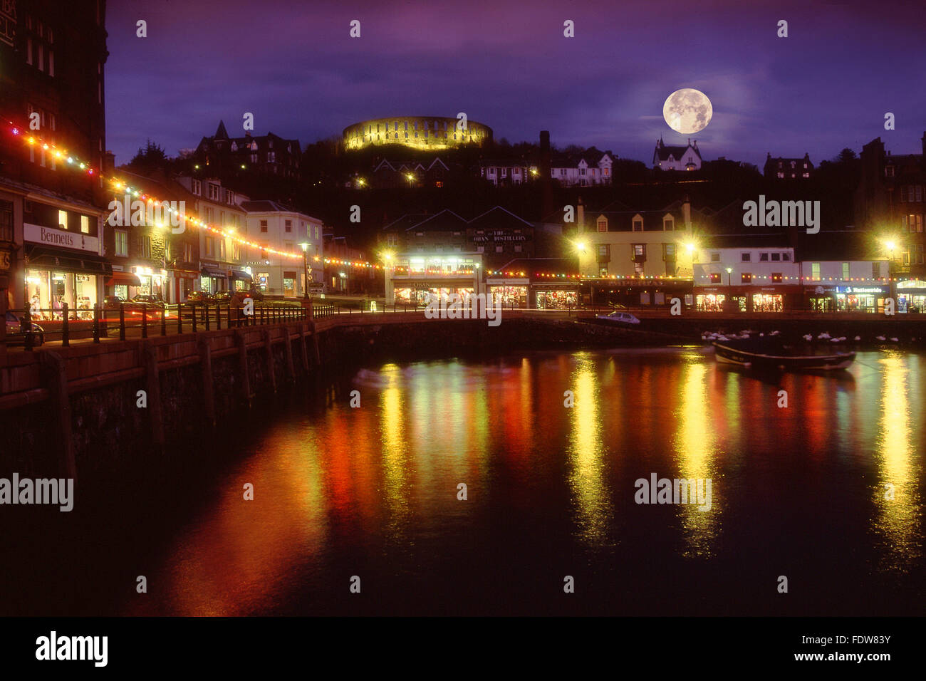 Christmas in Oban with McCaigs tower as seen from the north pier.Oban,Argyll,scotland.2008 Stock Photo