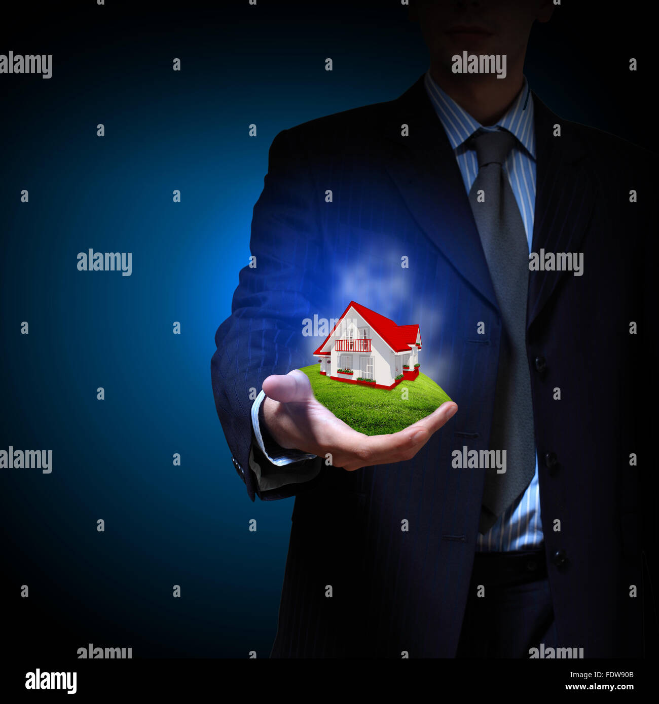 Residential building and a businessman holding it in his hands Stock ...